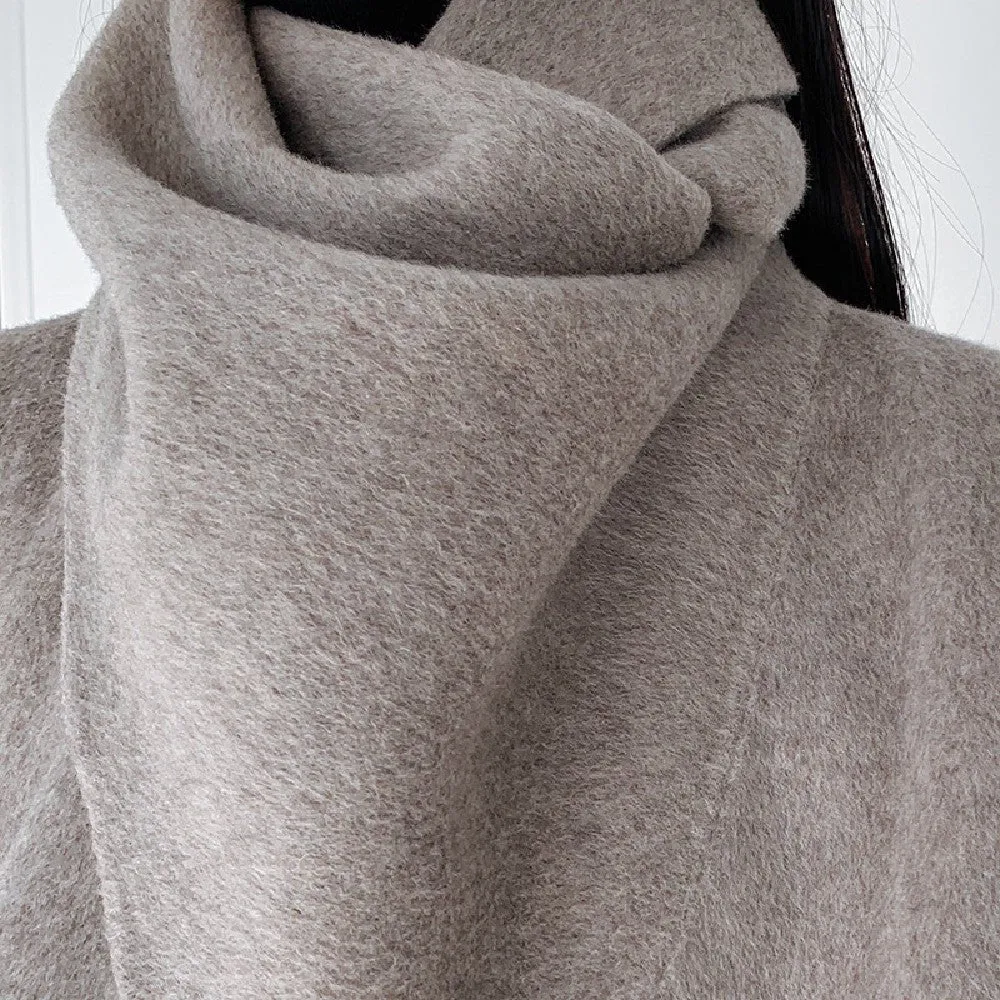 Feel the difference with our Women's Reversible Wool Coat.