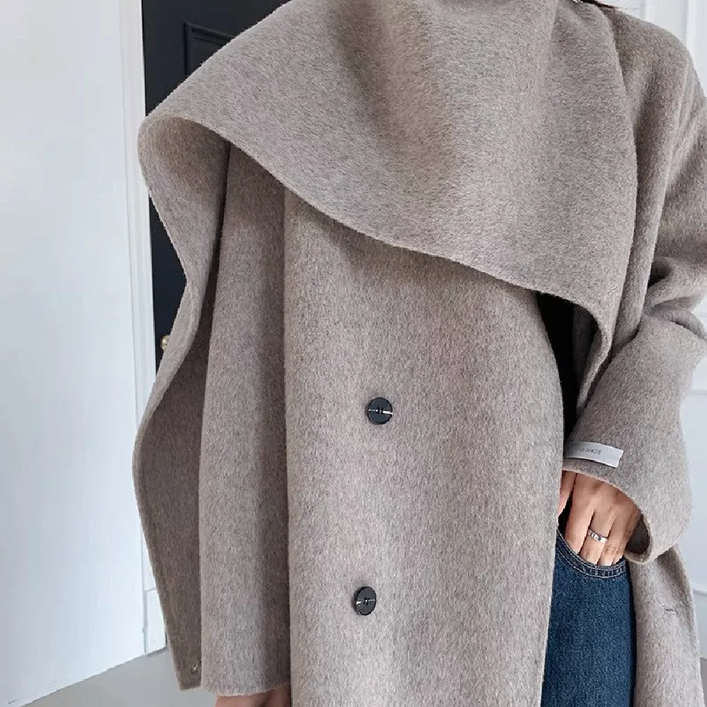 Feel the difference with our Women's Reversible Wool Coat.