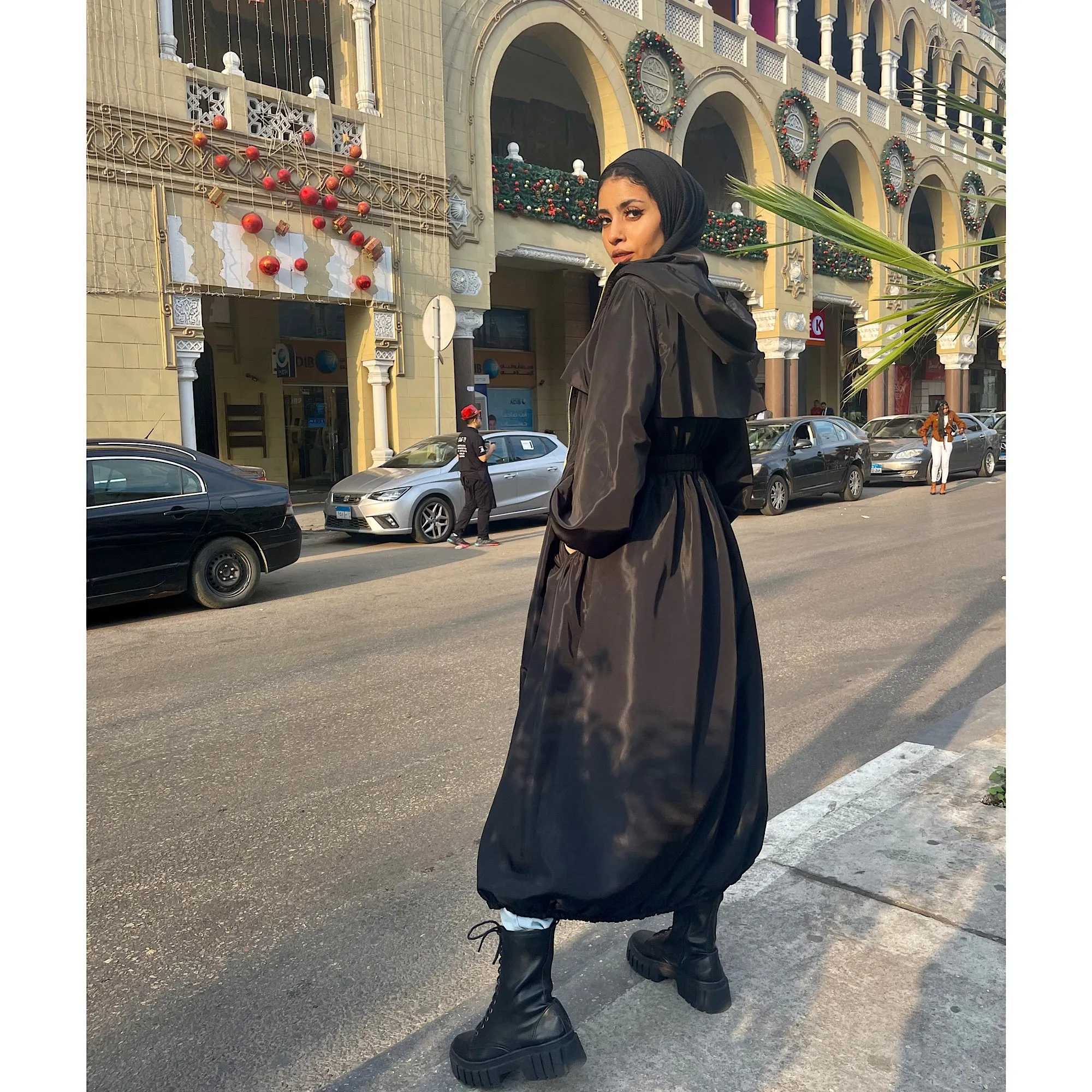 Long zipped black waterproof jacket