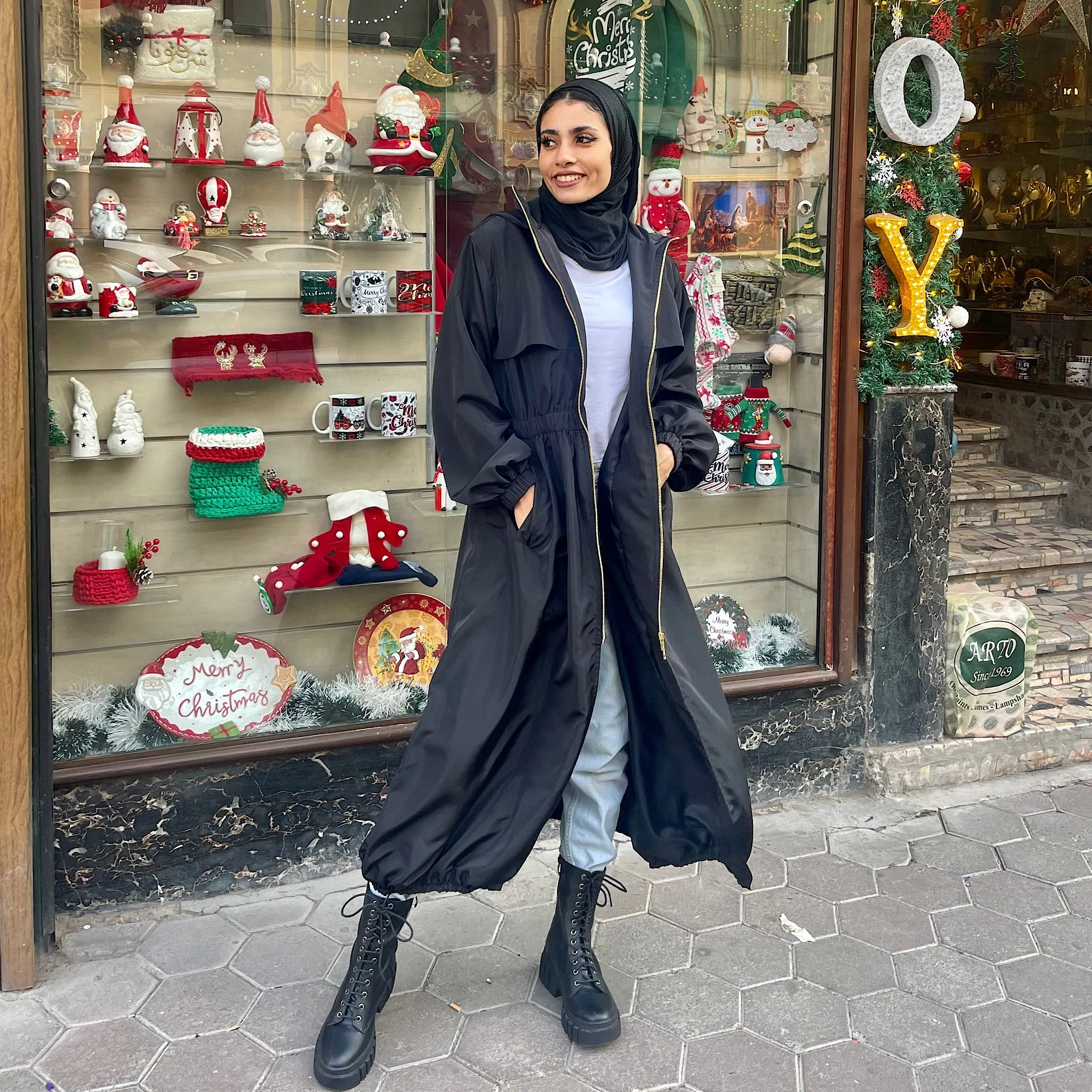 Long zipped black waterproof jacket