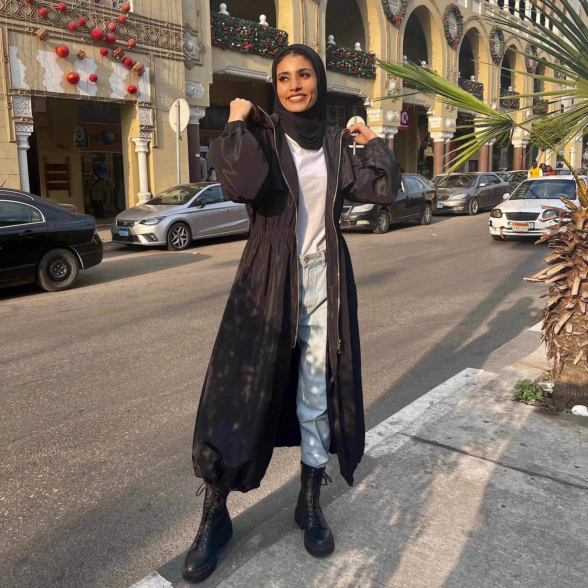 Long zipped black waterproof jacket