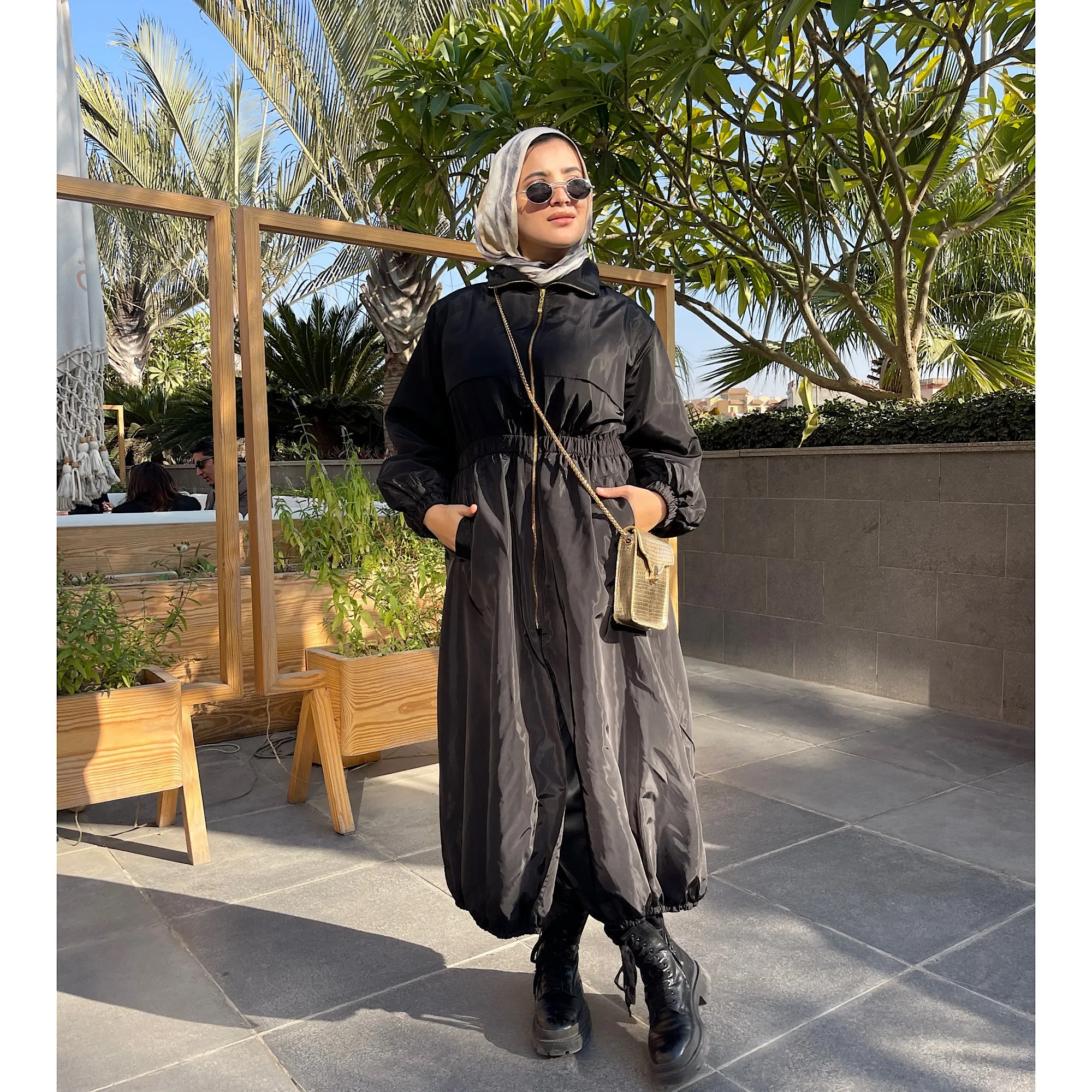 Long zipped black waterproof jacket