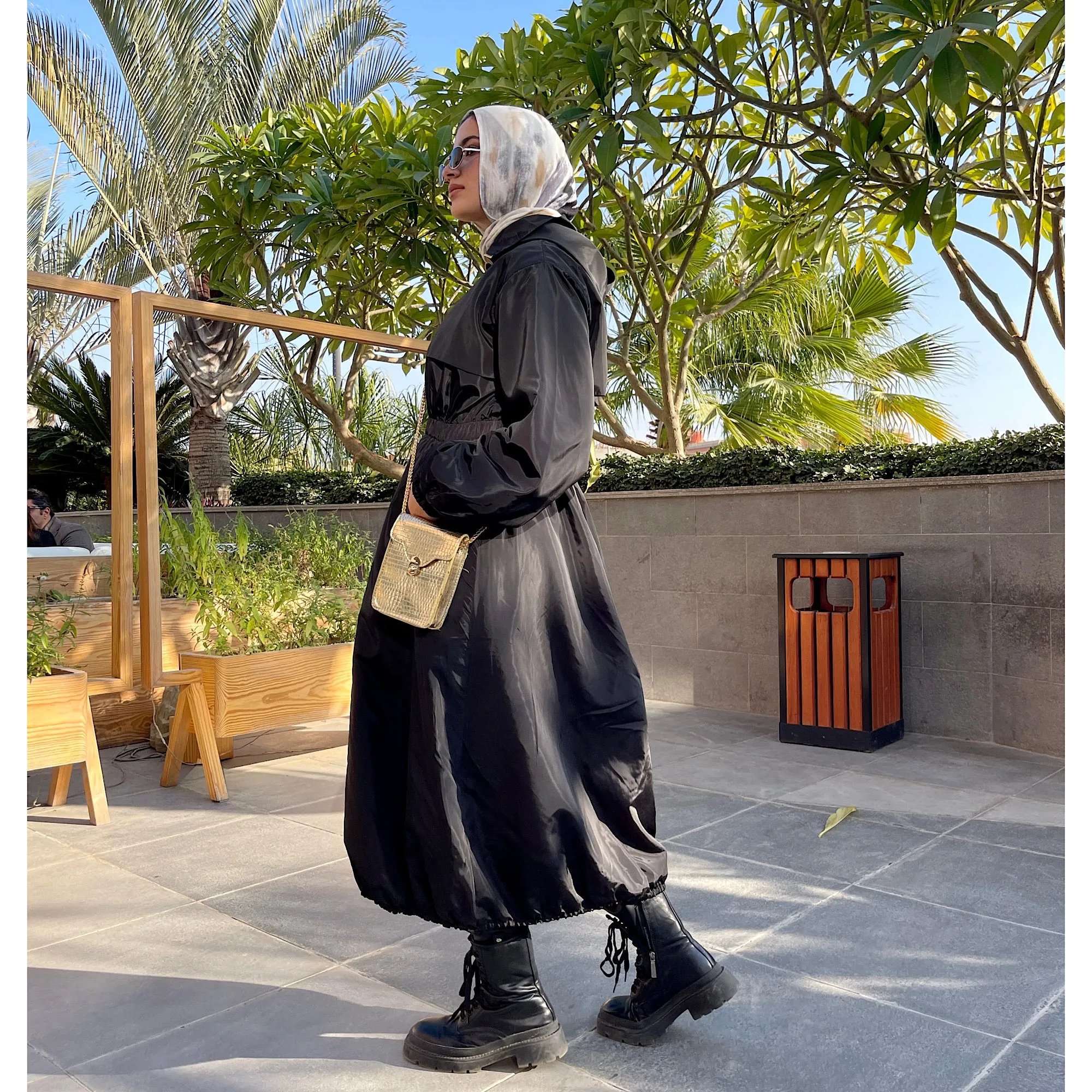 Long zipped black waterproof jacket